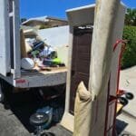 No-Contact Junk Removal Near Me: Safe, Easy Pickups in California 3 No-contact junk removal near me - Rapid Junk Pros crew loading a truck in California