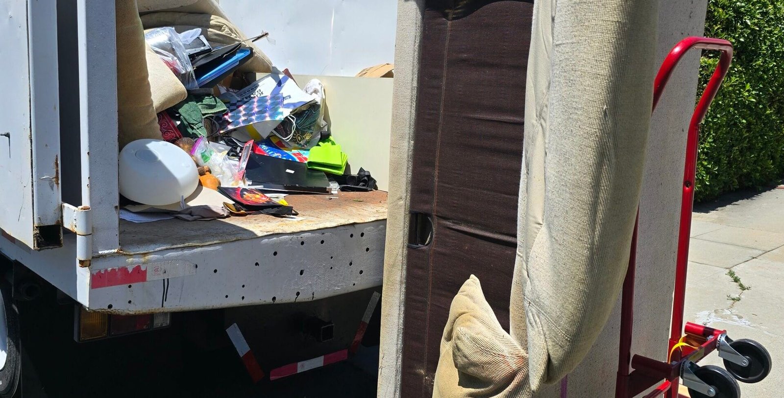 No-Contact Junk Removal Near Me: Safe, Easy Pickups in California 1 No-contact junk removal near me - Rapid Junk Pros crew loading a truck in California
