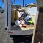 Junk Removal for Veterans Near Me: Trusted, Priority Service in California 3 Junk removal for veterans near me - Rapid Junk Pros crew hauling items in California