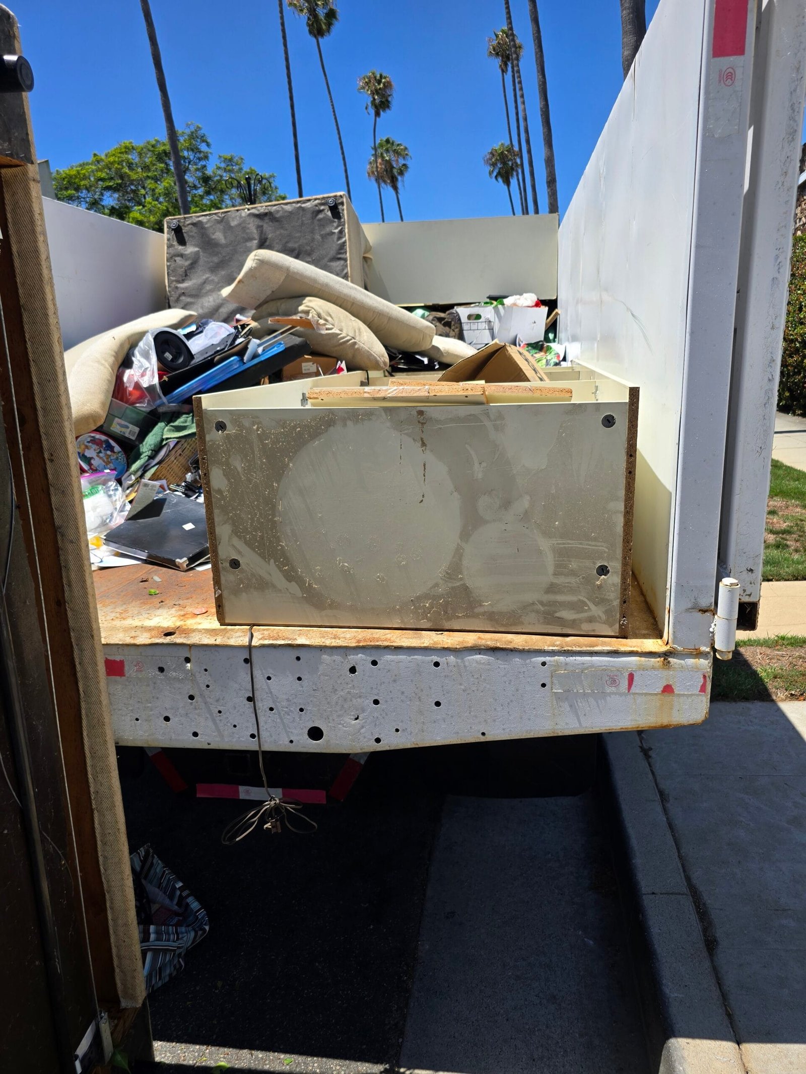 Junk Removal That Takes Everything Near Me: Full-Scope Hauling in California 2 Junk removal that takes everything near me - Rapid Junk Pros crew hauling mixed items in California