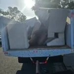 Same-Day Furniture Pickup Near Me: How Rapid Junk Pros Gets It Out Today 3 Same-day furniture pickup near me - Rapid Junk Pros truck loaded with couch furniture