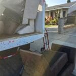 Pool Table Removal Los Angeles: How to Get a Slate Table Out Without Wrecking a Room 4 pool table removal Los Angeles crew hauling a disassembled slate pool table