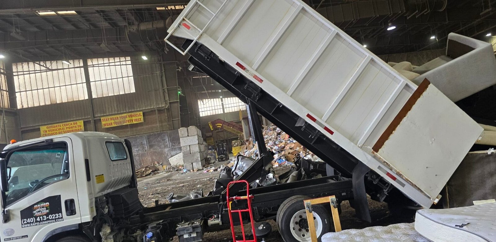 Exercise Equipment Removal Los Angeles: Getting Rid of Old Treadmills, Ellipticals & Home Gyms 1 exercise equipment removal Los Angeles crew hauling a treadmill