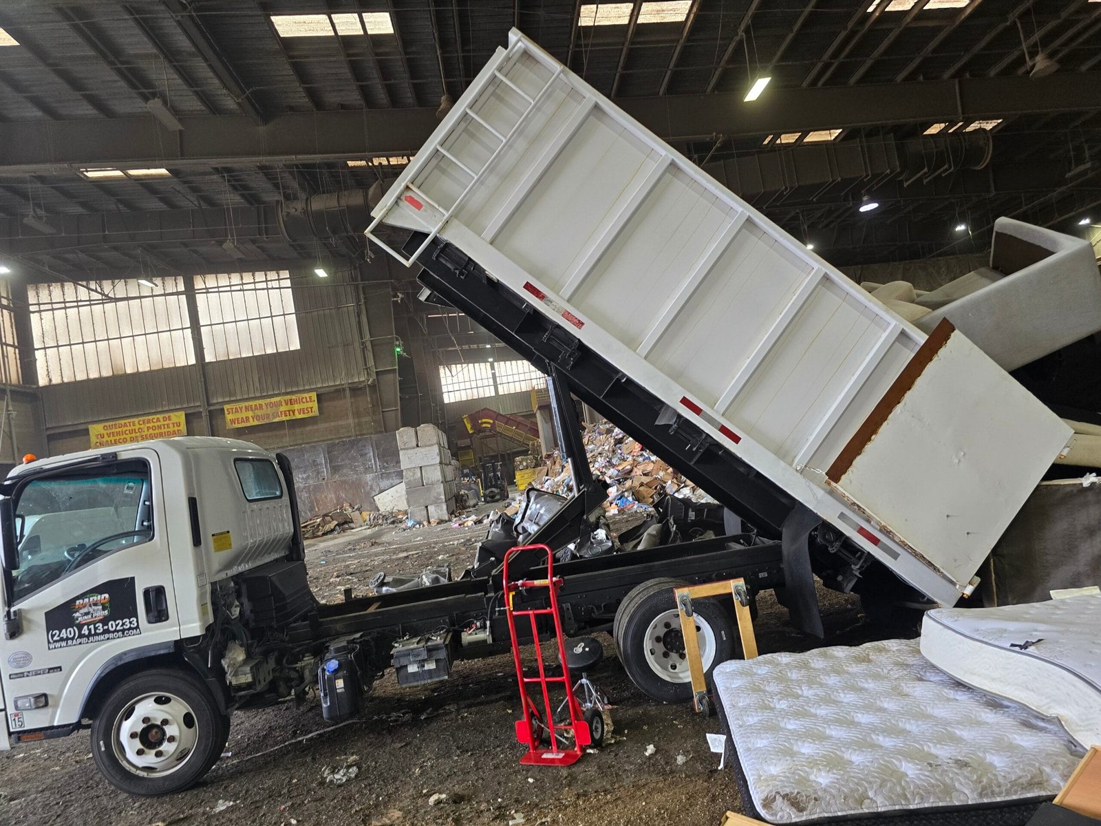 Exercise Equipment Removal Los Angeles: Getting Rid of Old Treadmills, Ellipticals & Home Gyms 2 exercise equipment removal Los Angeles crew hauling away an old treadmill
