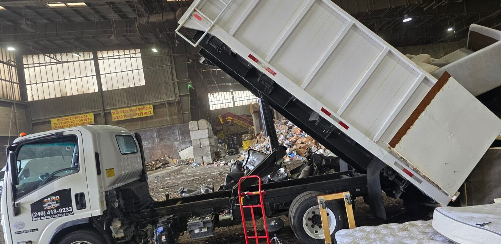 Trampoline Removal Los Angeles: Getting a Rusted-Out Trampoline Out of Your Yard 1 trampoline removal Los Angeles crew hauling an old trampoline frame
