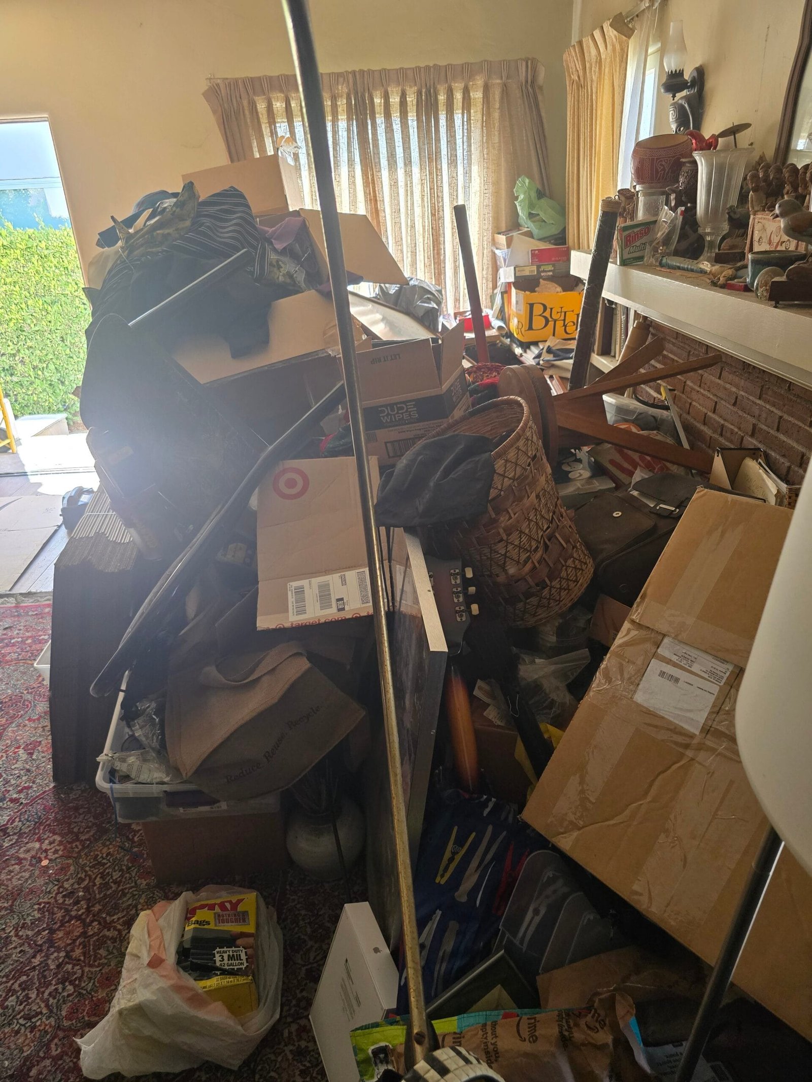 Pre-Listing Junk Removal for Real Estate Agents: 7 Costly Mistakes That Slow a Sale 3 crew hauling items for pre-listing junk removal for real estate agents
