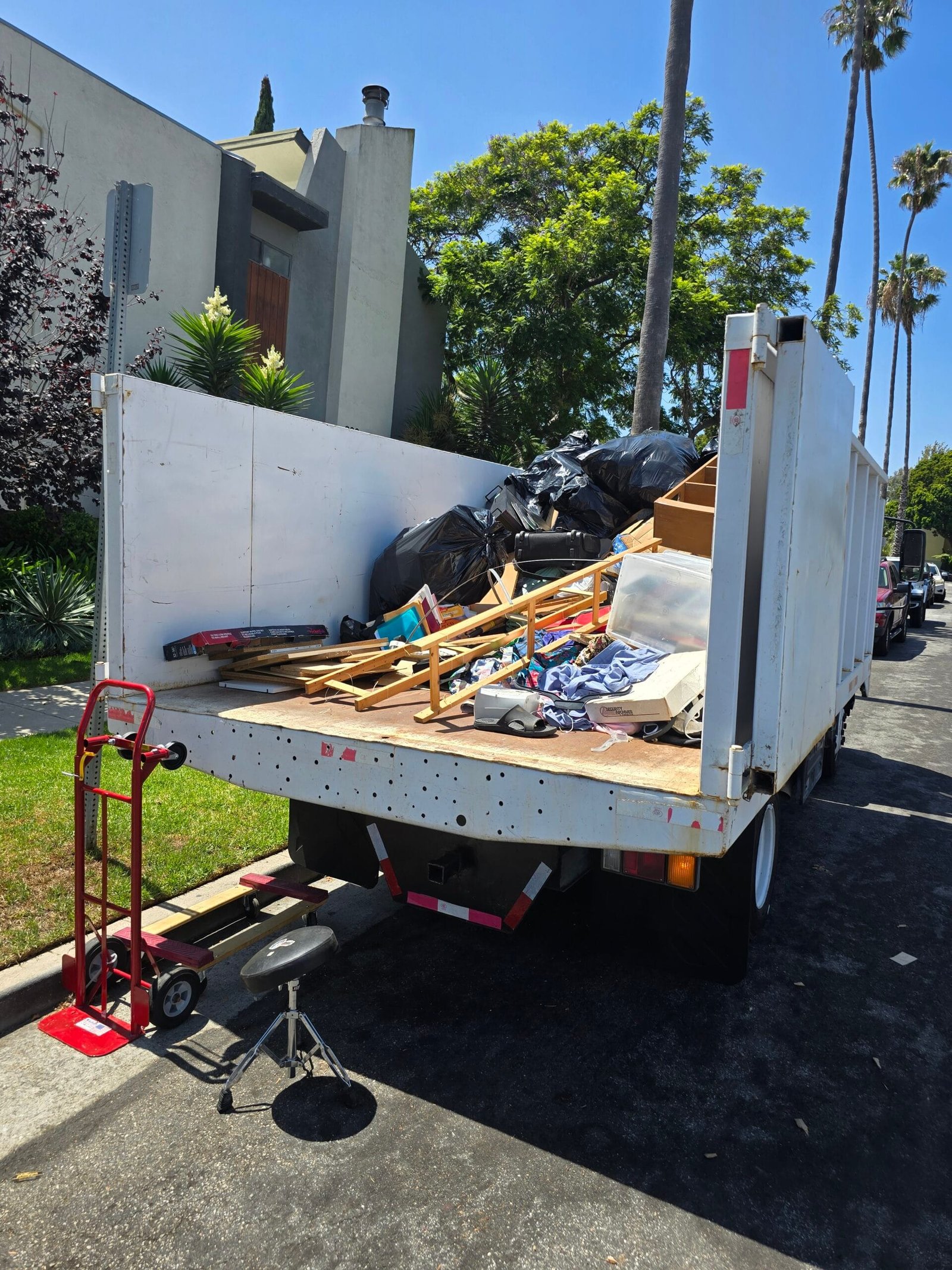 Junk Removal in Arts District, Los Angeles 2 Junk removal in Arts District Los Angeles crew loading a truck with furniture