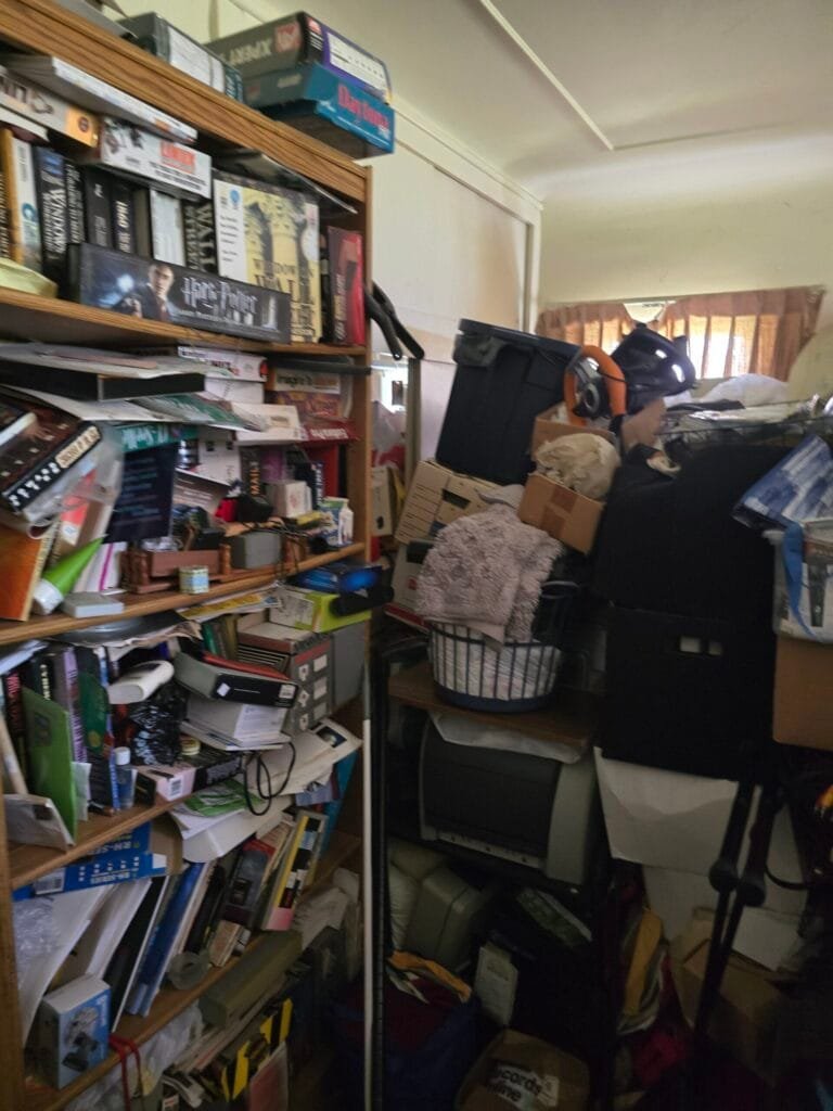 Junk Removal Tips for Los Angeles Homeowners and Businesses 2 Room with shelves full of books, boxes and stored household items